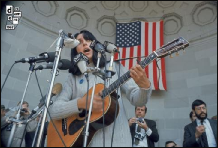 DREAMERS-1968-GETTY-IMAGES - Joan Baez sings during an anti-war rally in Central Park New York - April 3